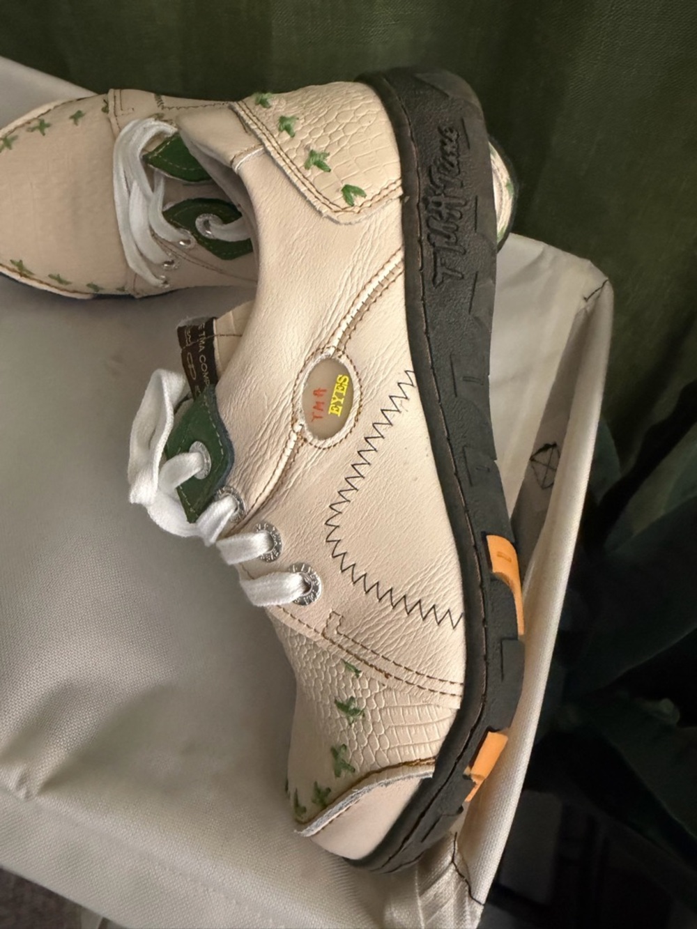 Cream Leather Women's Sneakers with Green Accents and Black Sole